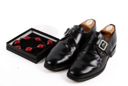 Pair of Sanders Lewis men's black leather shoes and 'Zara' necklace.