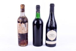 Three bottles of wine, two without labels (AF).