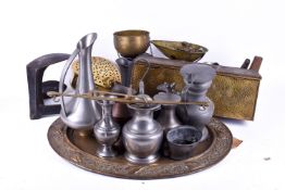 Collection of assorted pewter and brass items.