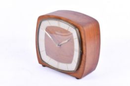 A mid-century Smiths Temora mahogany cased mantel clock. Striking to a gong, key present.
