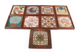 A collection of nine assorted late 19th century ceramic wall tiles, framed. Total, most 17.5cm x 17.