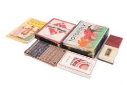 A group of assorted vintage playing card sets and games. Including Cincinnati Game Co.