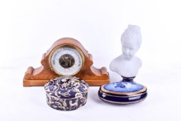 A group of four assorted collectable items.