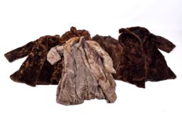 A collection of assorted vintage women's fur garments (af).