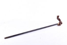 A vintage rootwood handled walking cane.