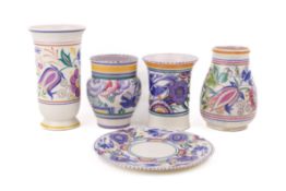 Five assorted mostly mid-century Poole Pottery items with blue birds.