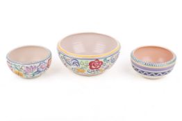 Three assorted Poole Pottery Delphis bowls.