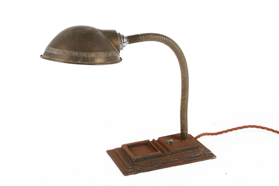 A circa 1930s gooseneck desk lamp with a cast metal rectangular base. - Image 1 of 3