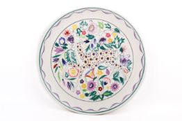 A large Poole Pottery Delphis charger 'Persian Deer' design.