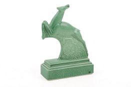 A Poole Pottery leaping deer statuette in celadon green.