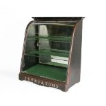 A shop counter-top arched glass display cabinet, J S Fry & Sons to the base.