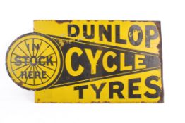 'Dunlop Cycle Tyres In Stoc Here' yellow double sided enamel advertising sign. 67cm x 35.