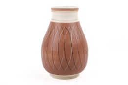 A mid-20th century Poole Pottery Freeform vase designed by Alfred Read. In the PRB pattern shape.