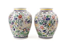 Two large Poole Pottery vases of identical 'Persian Deer' design.