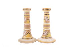 A pair of Carter, Stabler & Adams Poole Pottery Art Deco candlesticks.