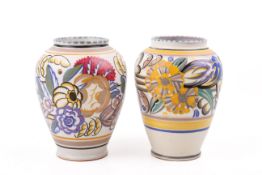 Two Carter, Stabler & Adams poole Pottery vases. Decorated with floral patterns.