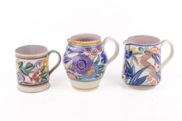 Three Poole Pottery items with handles. Mug shape 310 pattern PB Bluebird by Eileen Prangnell H14.