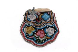 A 19th century Native American beaded purse.