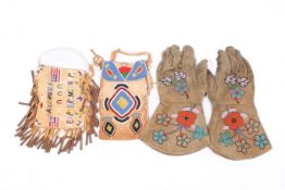 A pair of Native Canadian beaded gloves and two bags.
