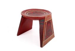 A mid-20th century Peruvian wooden stool.