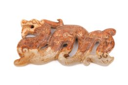 A Han Dynasty style jade dragon plaque.