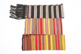 Three lengths of woven fabric or scarves, possibly Tibetan.