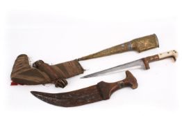 An Afghan Choora dagger and a kukri.