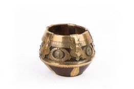 An Indian brass band wooden bowl known as a sherpai or kunke.