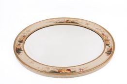 An oval chinoiserie style wall mirror.
