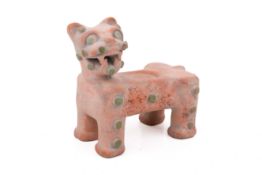 A 20th century Mexican terracotta jaguar figure candle holder.