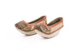 A pair of 19th century Chinese manchu platform shoes.