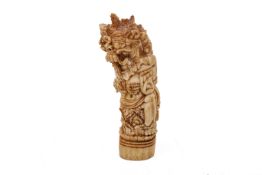 A Balinese carved bone kris handle.
