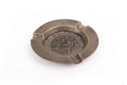 A Chinese white metal Tuckchong ashtray.