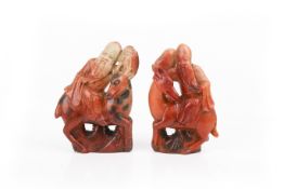 Two Chinese soapstone carvings of immortals.