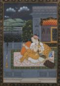 An Indian Mughal style watercolour painting of a courting couple.