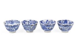 A set of four Chinese blue and white tea cups.