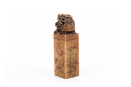 A Chinese soapstone seal.