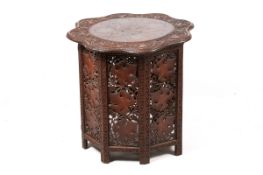 A vintage Anglo-Indian brass inlaid carved wood top and folding stand.
