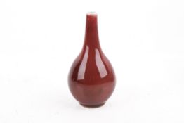 A 20th century Chinese sang de boeuf bottle vase.
