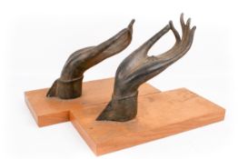 A pair of large bronze 'Buddha hands'.