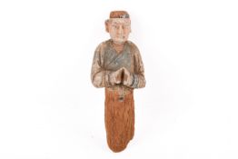 A Chinese painted wood funerary figure.