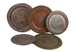 Five Persian and other metal trays.