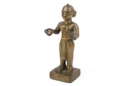 A 19th century style Indian bronze figure of the deity Radha.
