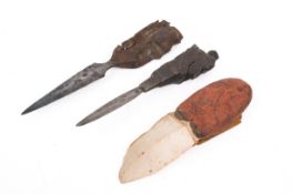 Two Belgian Trench art daggers and a flint knife.