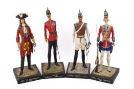 A group of four hand made wooden military figures. Including 'The Duke of Marlborough 1712', etc.