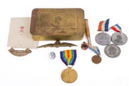 A Princess Mary Christmas 1914 tin, medals and other related items.