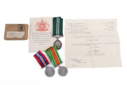 A selection of WWII medals. Comprising an Air Efficiency Medal awarded to Corporal J Kiy R.A.F.V.R.