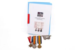 A group of WWI medals, badges and paperwork attributed to Lindsey Edward Goddard.