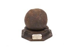 An 18th century cast iron Cannonball salvaged in 1912 from the wreck of the British 32-gun Frigate