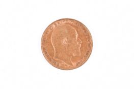A 1908 half sovereign coin.
